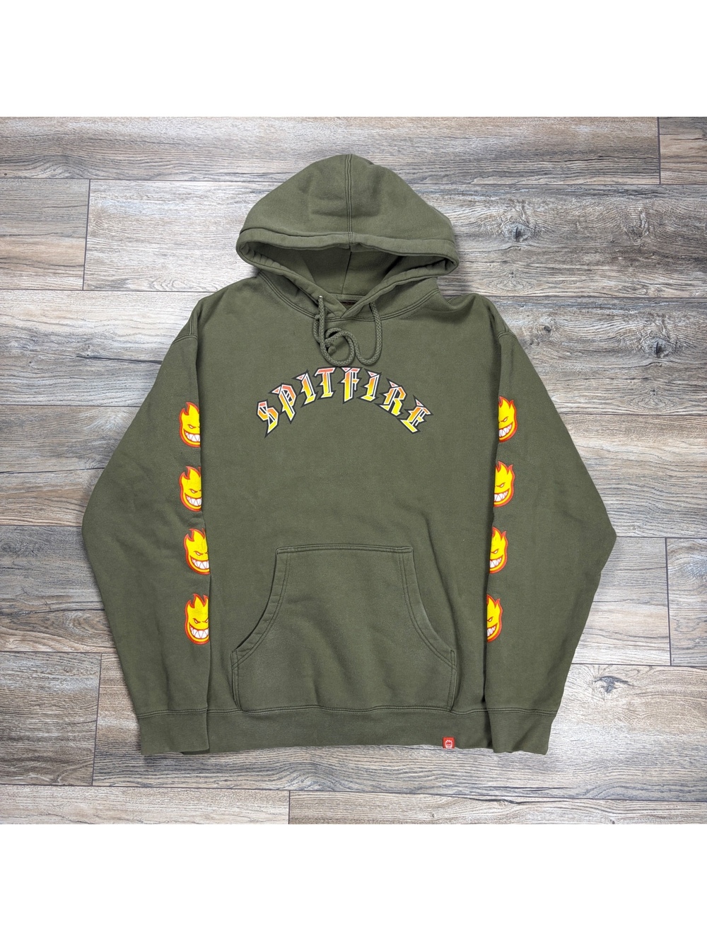 Y2K Spitfire olive pullover hoodie with sleeve graphics